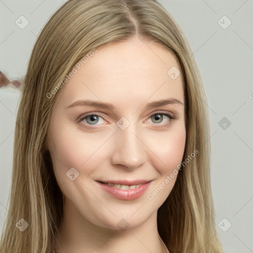 Joyful white young-adult female with long  brown hair and grey eyes