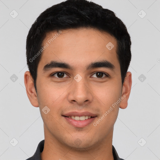 Joyful latino young-adult male with short  brown hair and brown eyes