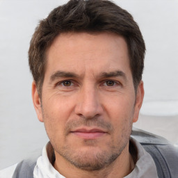 Neutral white adult male with short  brown hair and brown eyes