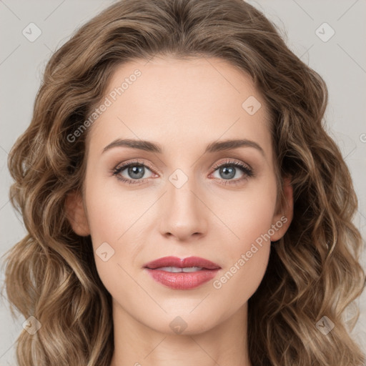 Joyful white young-adult female with long  brown hair and green eyes