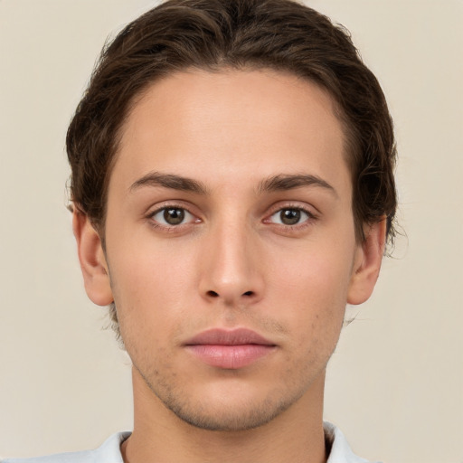 Neutral white young-adult male with short  brown hair and brown eyes