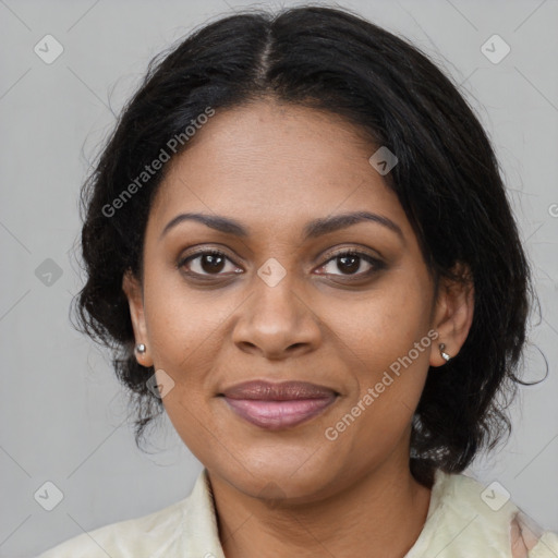 Joyful black young-adult female with medium  brown hair and brown eyes