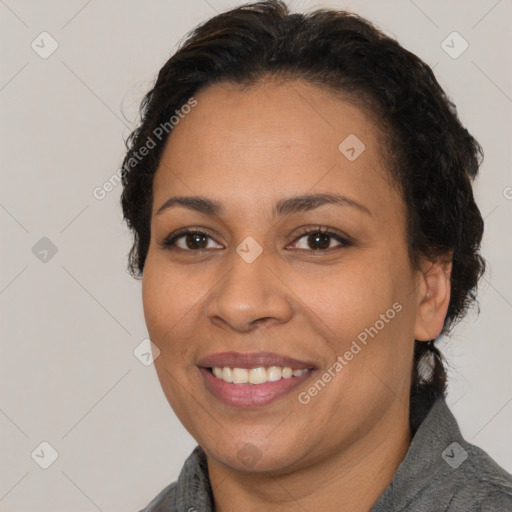 Joyful white adult female with short  brown hair and brown eyes