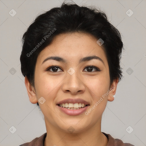 Joyful asian young-adult female with short  black hair and brown eyes