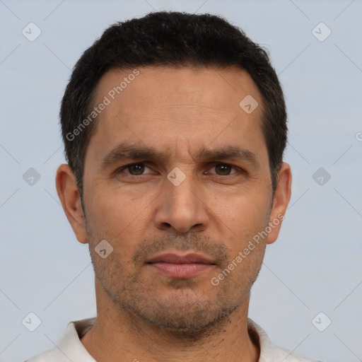 Neutral white adult male with short  brown hair and brown eyes