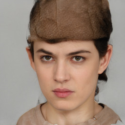 Neutral white young-adult female with short  brown hair and brown eyes