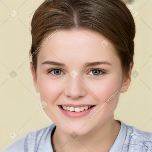 Joyful white child female with short  brown hair and brown eyes