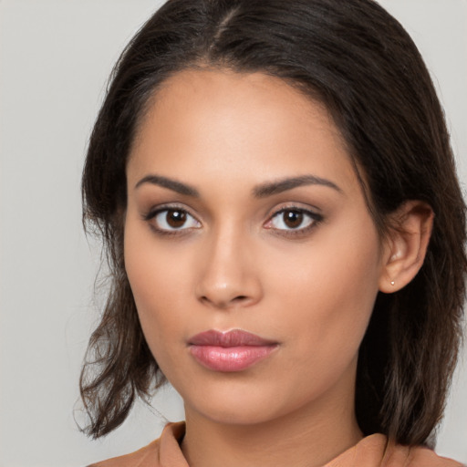 Neutral white young-adult female with medium  brown hair and brown eyes