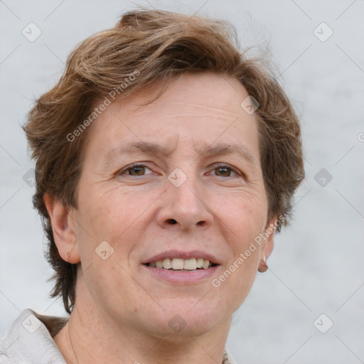 Joyful white adult female with short  brown hair and grey eyes