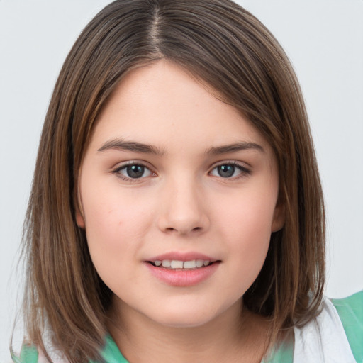 Joyful white child female with medium  brown hair and brown eyes