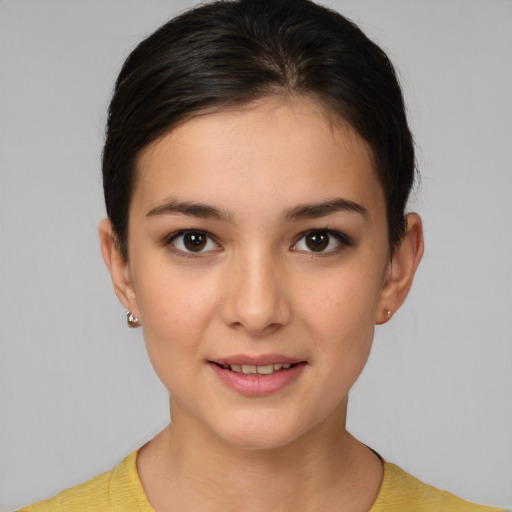 Joyful white young-adult female with short  brown hair and brown eyes