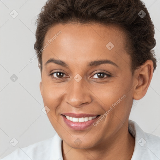 Joyful white young-adult female with short  brown hair and brown eyes