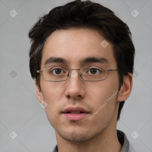 Neutral white young-adult male with short  brown hair and brown eyes