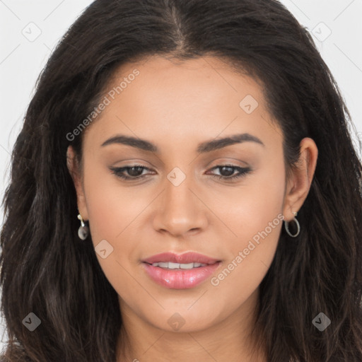 Joyful latino young-adult female with long  brown hair and brown eyes