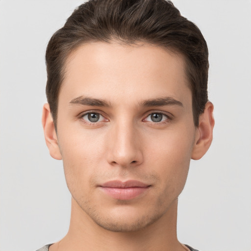 Neutral white young-adult male with short  brown hair and brown eyes