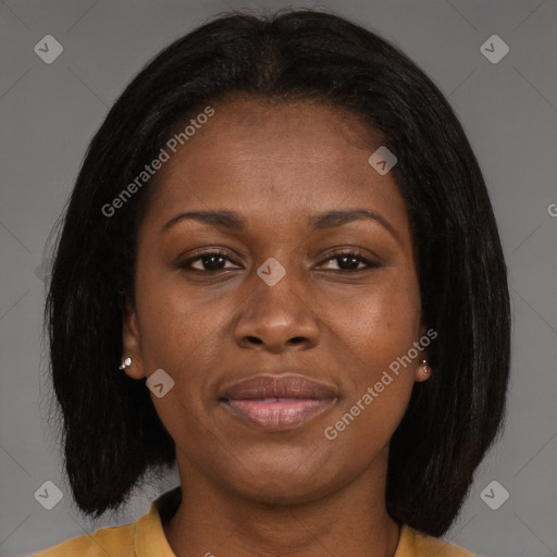 Joyful black young-adult female with long  brown hair and brown eyes