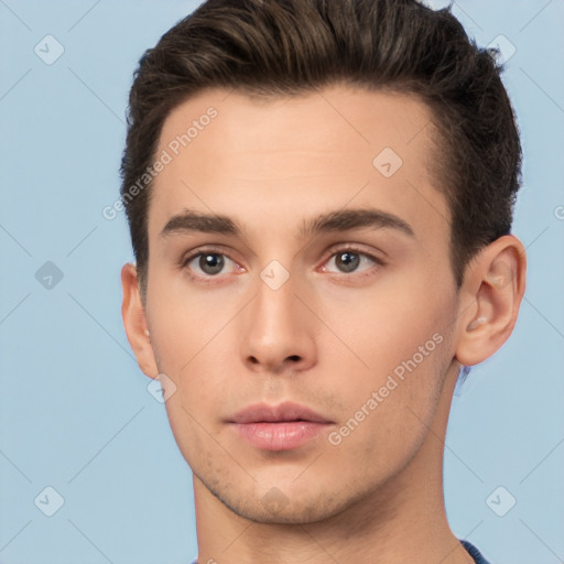 Neutral white young-adult male with short  brown hair and brown eyes