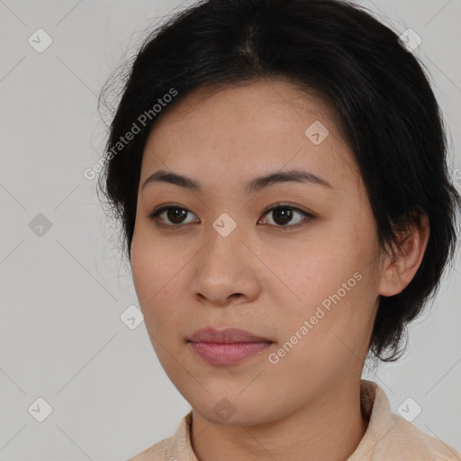 Neutral asian young-adult female with medium  brown hair and brown eyes