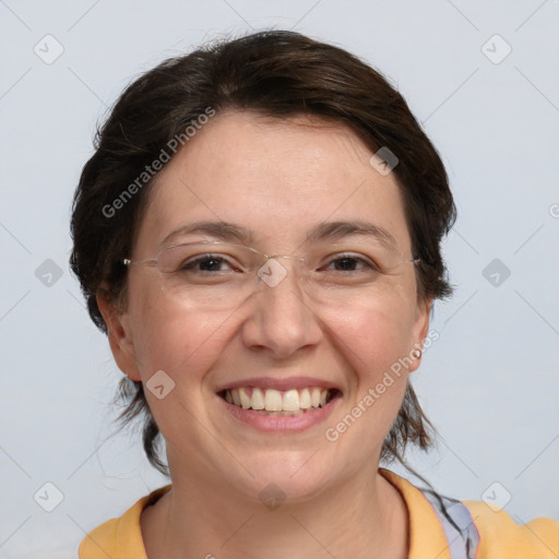 Joyful white adult female with medium  brown hair and grey eyes