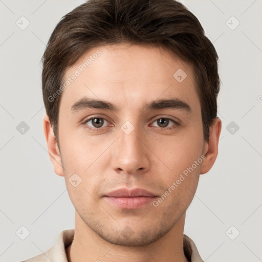 Neutral white young-adult male with short  brown hair and brown eyes