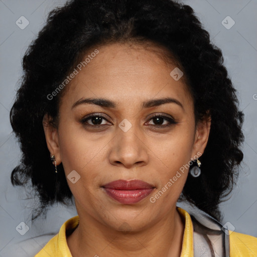 Joyful latino adult female with short  brown hair and brown eyes