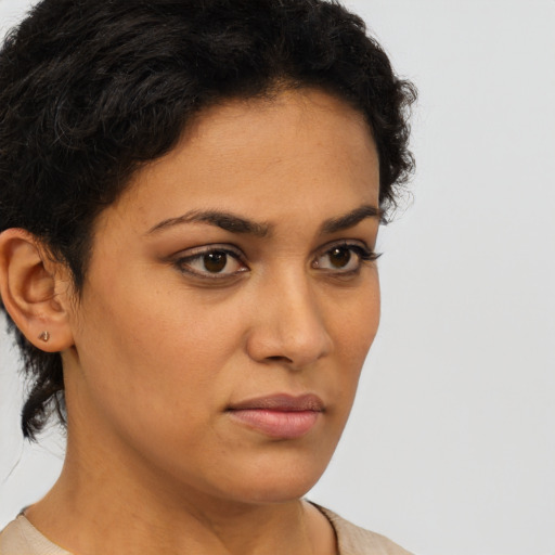 Neutral latino young-adult female with short  brown hair and brown eyes