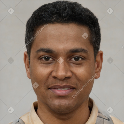 Joyful latino young-adult male with short  black hair and brown eyes