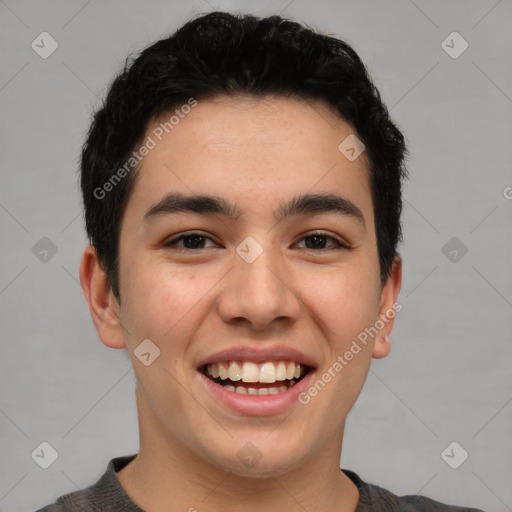 Joyful latino young-adult male with short  black hair and brown eyes