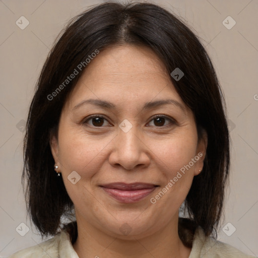 Joyful white adult female with medium  brown hair and brown eyes