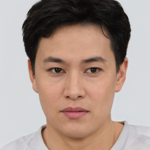 Neutral asian young-adult male with short  brown hair and brown eyes