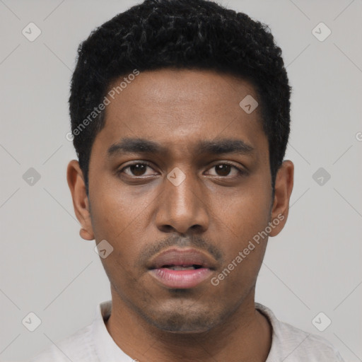 Neutral black young-adult male with short  black hair and brown eyes