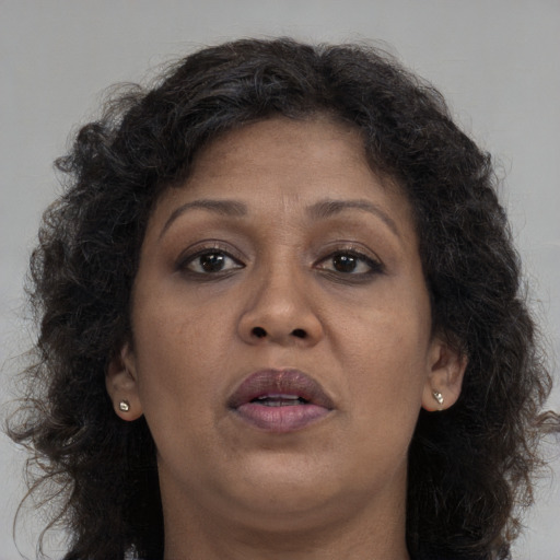 Neutral white adult female with long  brown hair and brown eyes