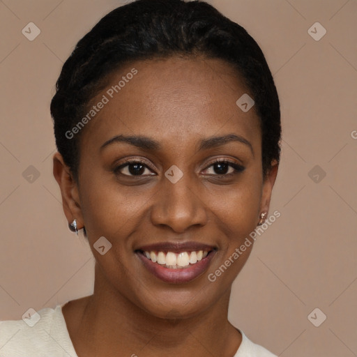 Joyful black young-adult female with short  black hair and brown eyes