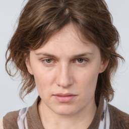 Neutral white young-adult female with medium  brown hair and grey eyes