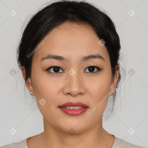 Joyful asian young-adult female with medium  brown hair and brown eyes