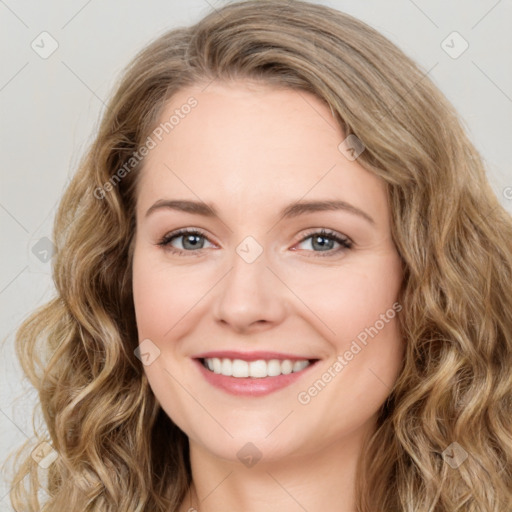 Joyful white young-adult female with long  brown hair and green eyes