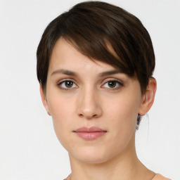 Neutral white young-adult female with short  brown hair and brown eyes