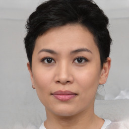 Joyful asian young-adult female with short  black hair and brown eyes