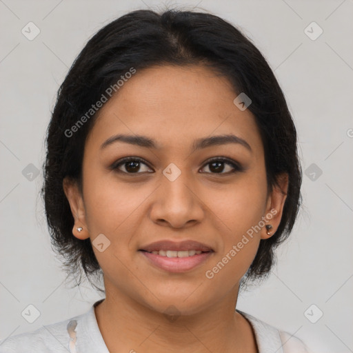 Joyful latino young-adult female with medium  black hair and brown eyes