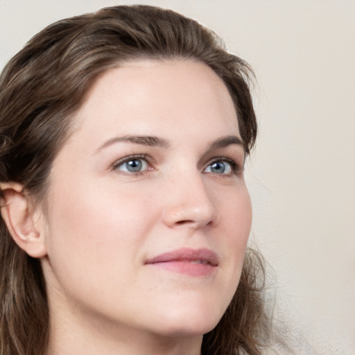 Neutral white young-adult female with long  brown hair and grey eyes