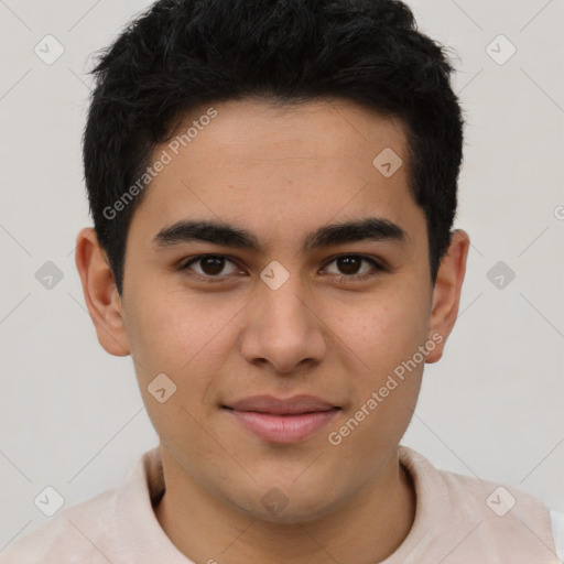 Joyful latino young-adult male with short  brown hair and brown eyes