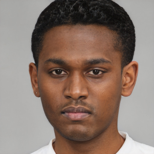 Neutral black young-adult male with short  black hair and brown eyes
