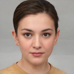 Neutral white young-adult female with short  brown hair and brown eyes