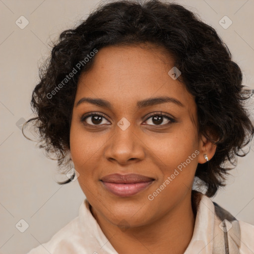 Joyful black young-adult female with medium  brown hair and brown eyes