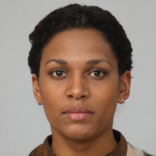 Neutral black young-adult female with short  brown hair and brown eyes