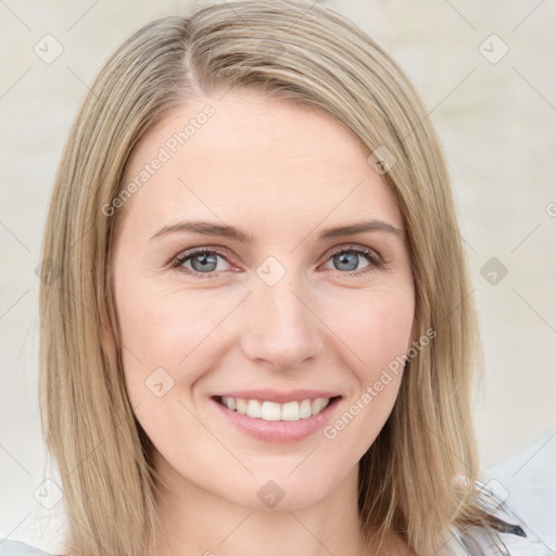 Joyful white young-adult female with medium  brown hair and blue eyes