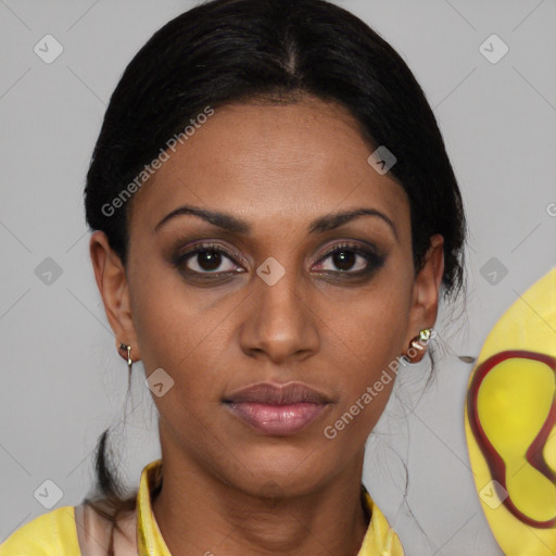 Joyful latino young-adult female with medium  brown hair and brown eyes