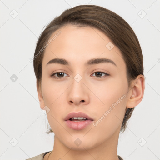 Neutral white young-adult female with medium  brown hair and brown eyes