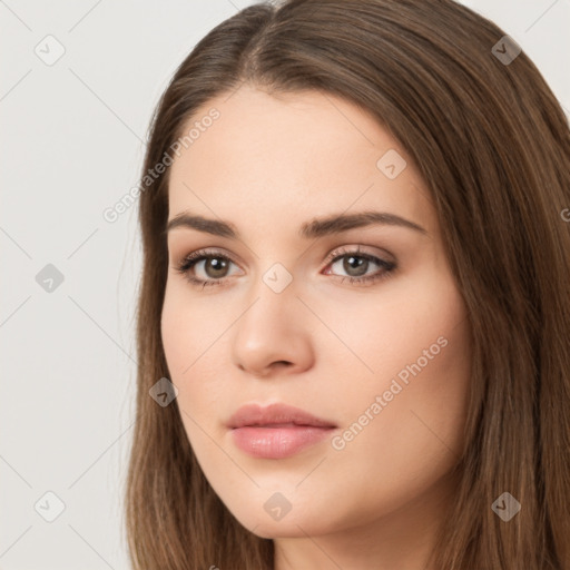 Neutral white young-adult female with long  brown hair and brown eyes