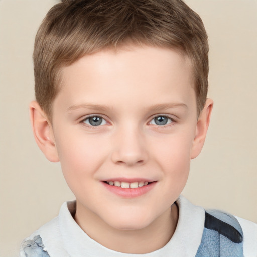 Joyful white child male with short  brown hair and brown eyes